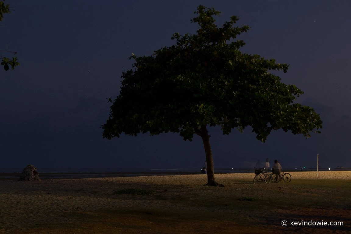 Collecting the bicycles, Sanur Beach, Bali.