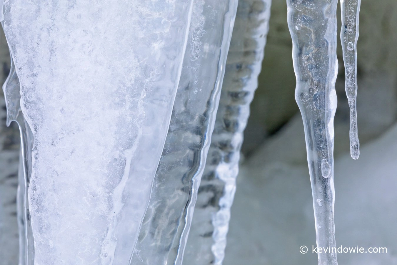 Icicles hanging at the entrance to a small cave, Antarctica.